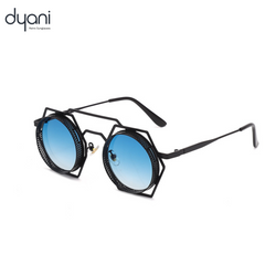 Dyani RoundSix sunglasses with unique six-sided round frame in blue lenses, featuring durable acetate and metal material.