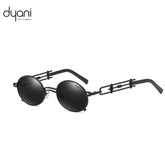 Dyani JazzyOval retro sunglasses with bold black oval lenses and unique metal handles, perfect for a stylish, contemporary look.