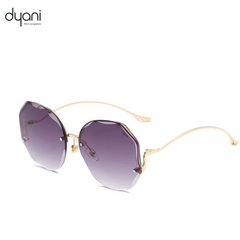 Dyani Disco Butterfly rimless gradient sunglasses with UV400 protection, 70s vintage style, and lightweight design.