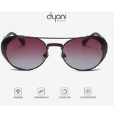 The NightRider sunglasses with red gradient lenses and side shields by Dyani offering UV protection and durability.