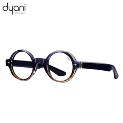 The Joplin round sunglasses with keyhole bridge, earthy tones, tortoiseshell temples, and bold retro style from Dyani.