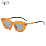 The Solix sunglasses with retro geometric design in vibrant orange, featuring bold frames and smooth vibes for a stylish look.
