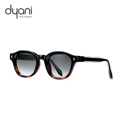 Mercer retro sunglasses with rounded frame, keyhole bridge, and gradient lenses by Dyani. Classic style and modern comfort in polished acetate.
