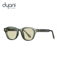 Green sunglasses with a clear frame on a white background, featuring the Dyani brand.