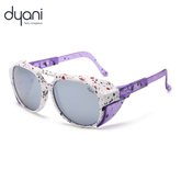 Retro inspired Stardust Dyani sunglasses with vibrant color flecks and unique texture, perfect for afterparties and sunrise sets.