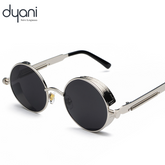 Dyani Eclipse Round Steampunk Sunglasses with durable metal frame, retro 70s style, perfect for festivals or concerts.