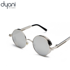 Dyani Eclipse round steampunk sunglasses with metal frame, retro 1970s-inspired eyewear, perfect for festivals and concerts.