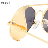 The Aviatix round sunglasses with metallic side shields in gold finish, perfect for desert festivals and party vibes at Burning Man.