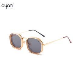 Dyani The Hex sunglasses in gold with steampunk vintage design, metal frame, and hollow out details, perfect for stylish individuals.