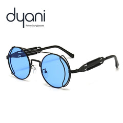 Dyani JLennon round sunglasses with blue lenses and metal frame, offering UV 400 protection and retro-cool style.