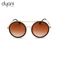 The Altair sunglasses with round lenses and metal detailing, blending bohemian and rockstar styles for a bold statement look.