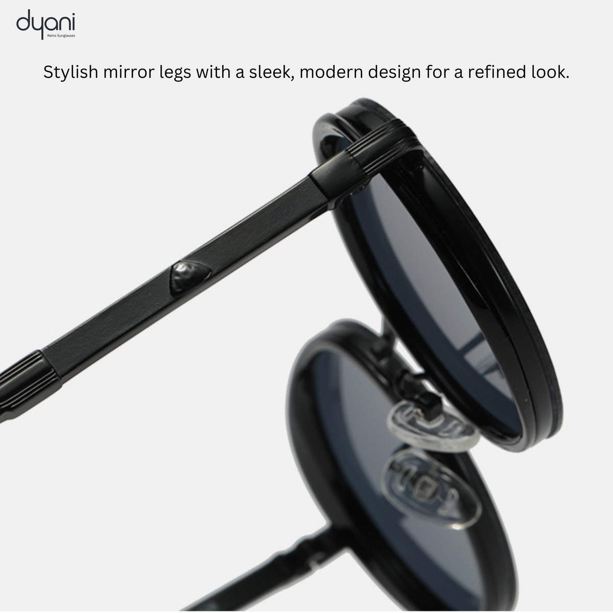 Close-up of The Luna steampunk-inspired round sunglasses showcasing sleek, stylish mirror legs and modern design for a refined vintage look.