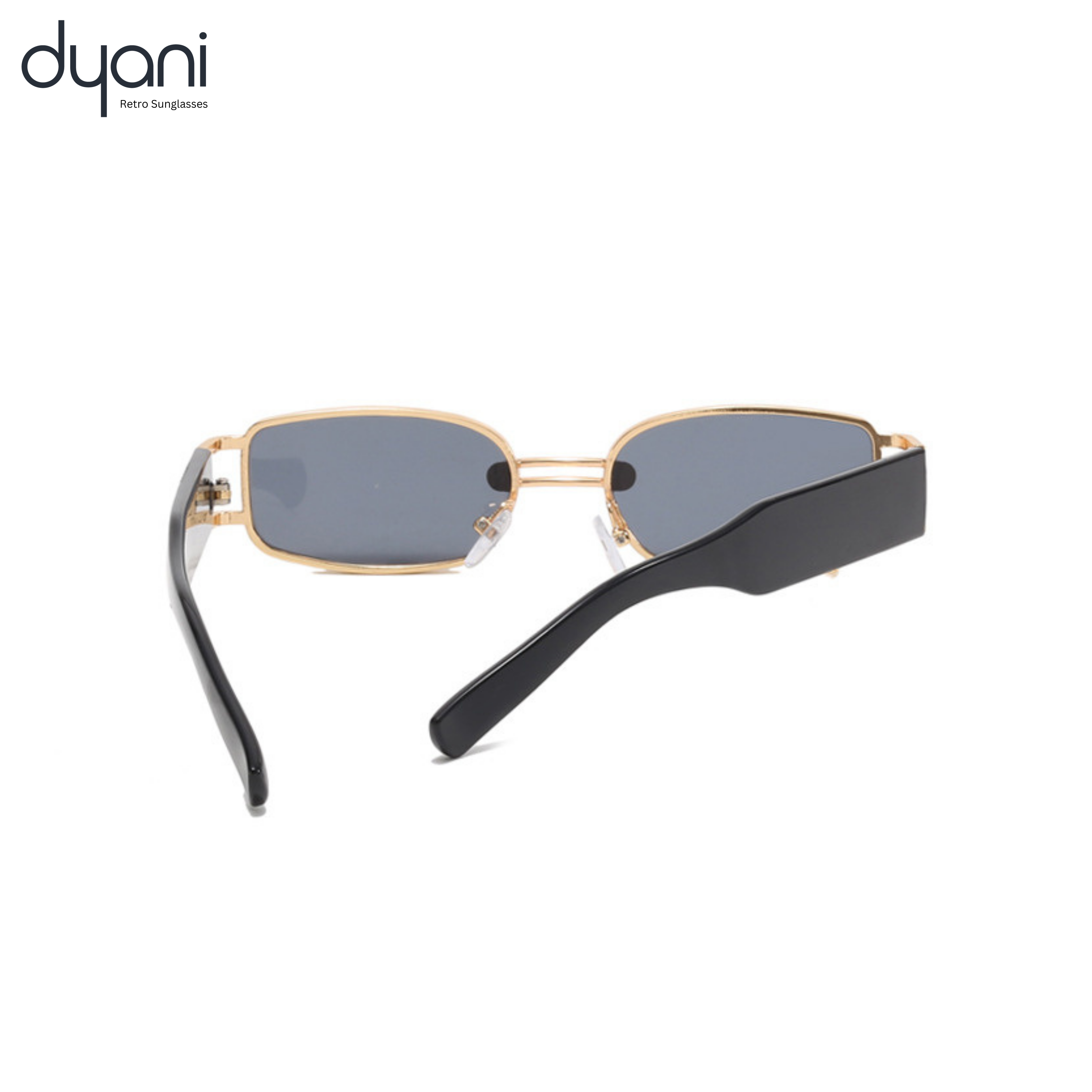 The Rebel sunglasses with gold metal frame, chain-link bridge, rectangular dark-tinted lenses, and wide black arms for UV400 protection.