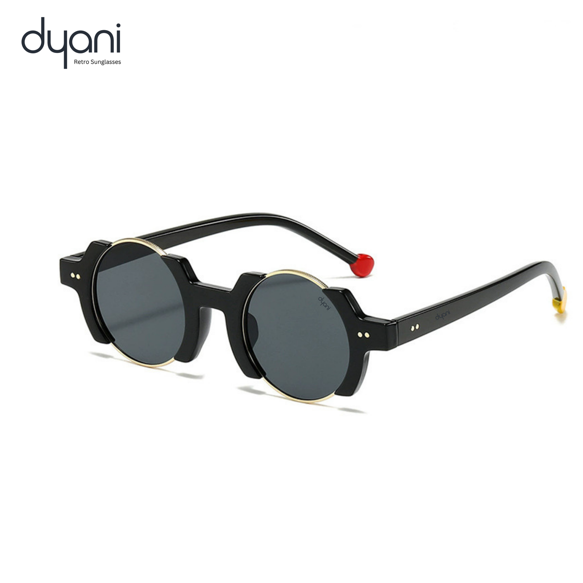 The Orbit sunglasses with round gold gradient lenses, black polycarbonate frame, and red and gold temple tips for retro flair.