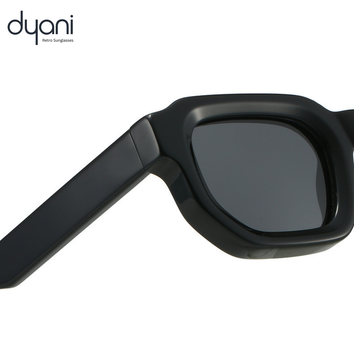 Close-up of chunky square acetate sunglasses frame with tinted lenses and sleek black design, showcasing bold retro modern style.