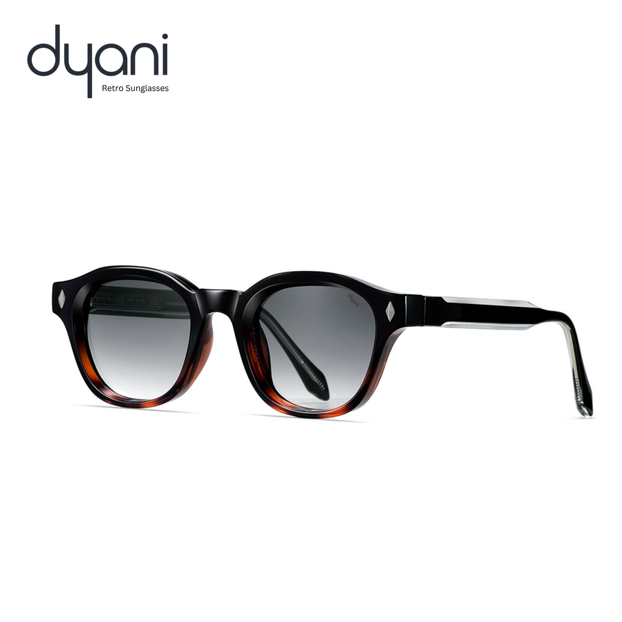 Mercer retro sunglasses with rounded frame, keyhole bridge, and gradient lenses by Dyani. Classic style and modern comfort in polished acetate.