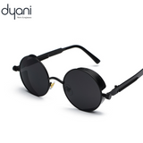 Eclipse round steampunk sunglasses with black metal frame by Dyani, perfect for festival fashion and 70s-style look.