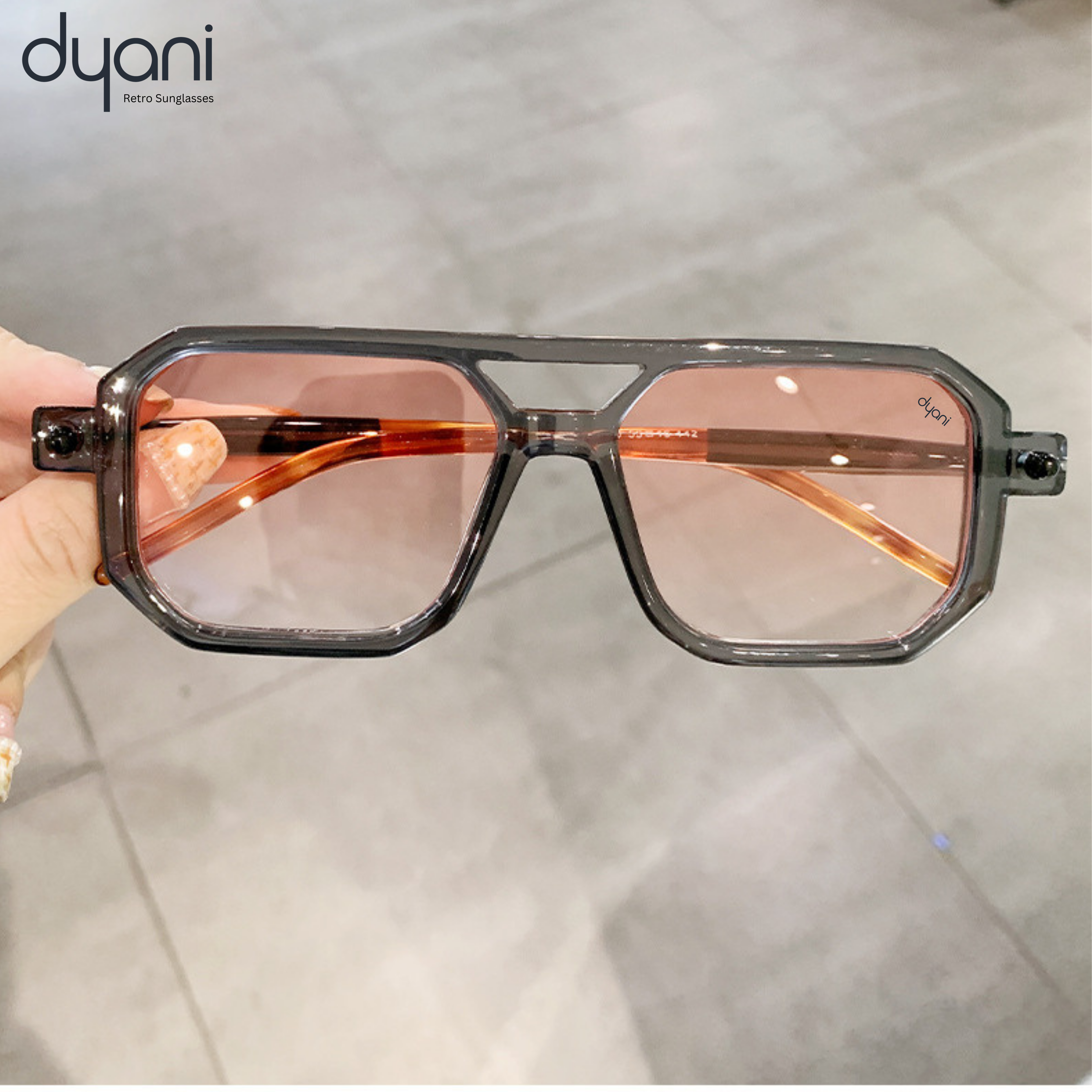 The Prismatik sunglasses with sharp-angled frame, translucent hues, and colorful lenses for urban and creative settings.