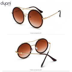 The Altair sunglasses with round lenses and metal detailing for a bohemian rockstar style, shown in two perspectives.
