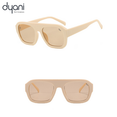 The Driftwood sunglasses in soft beige with minimalist design, offering a bold, effortless style for versatile wear.